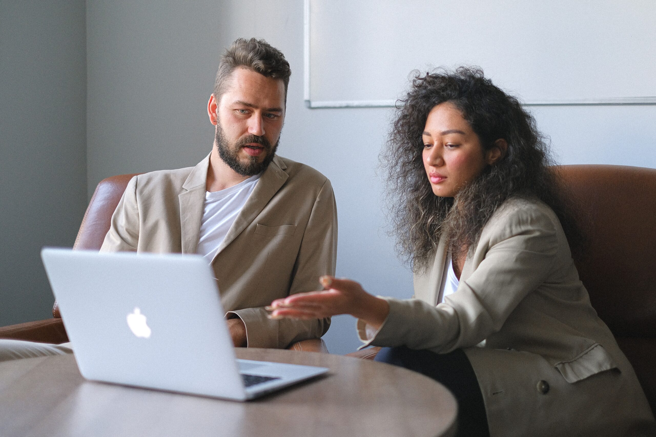 A project manager guiding a coworker on solving a Smartsheet unparseable error.