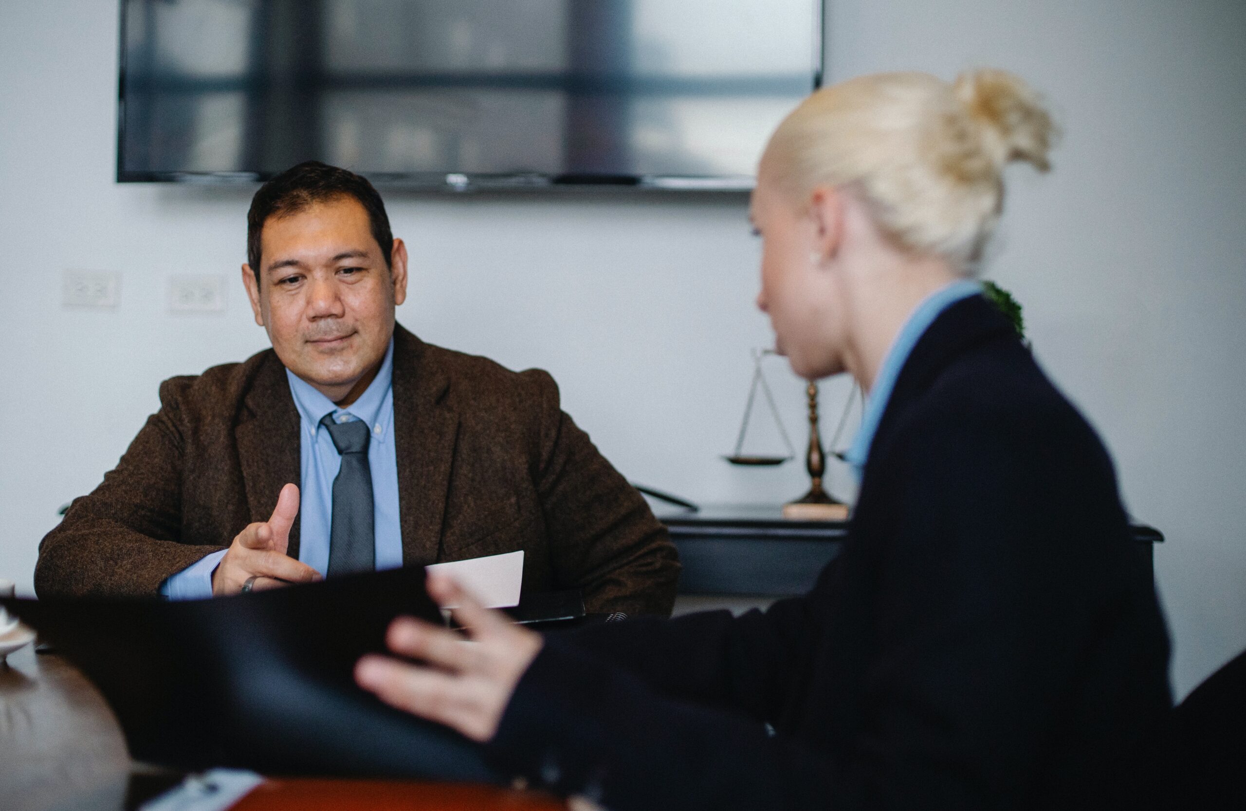 A project manager explaining overlapping schedules to a client.