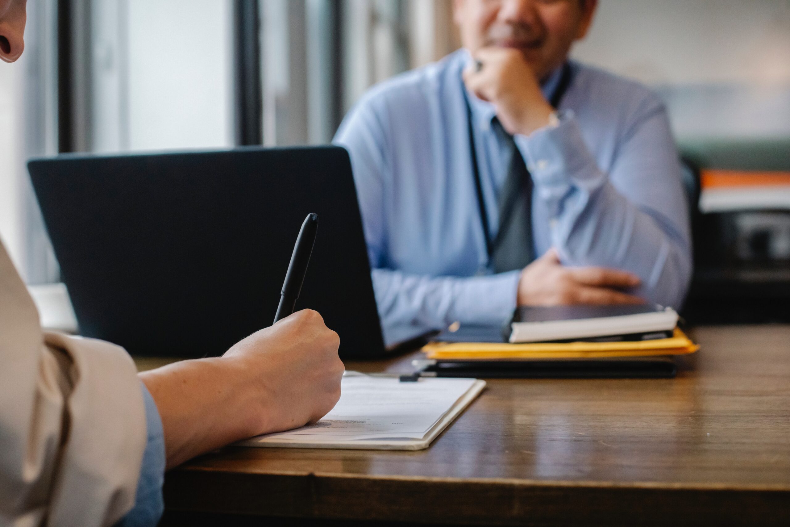 An HR manager for Smartsheet asking an interviewee Smartsheet interview questions.